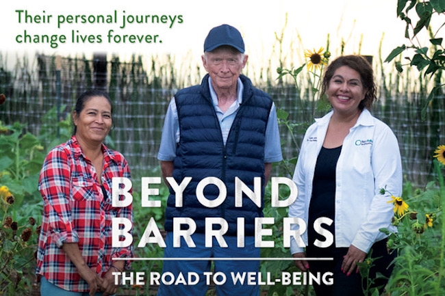 Two women and an older man stand in a garden surrounded by sunflowers, the text Beyond Barriers: The Road to Well-Being is written across the image in white