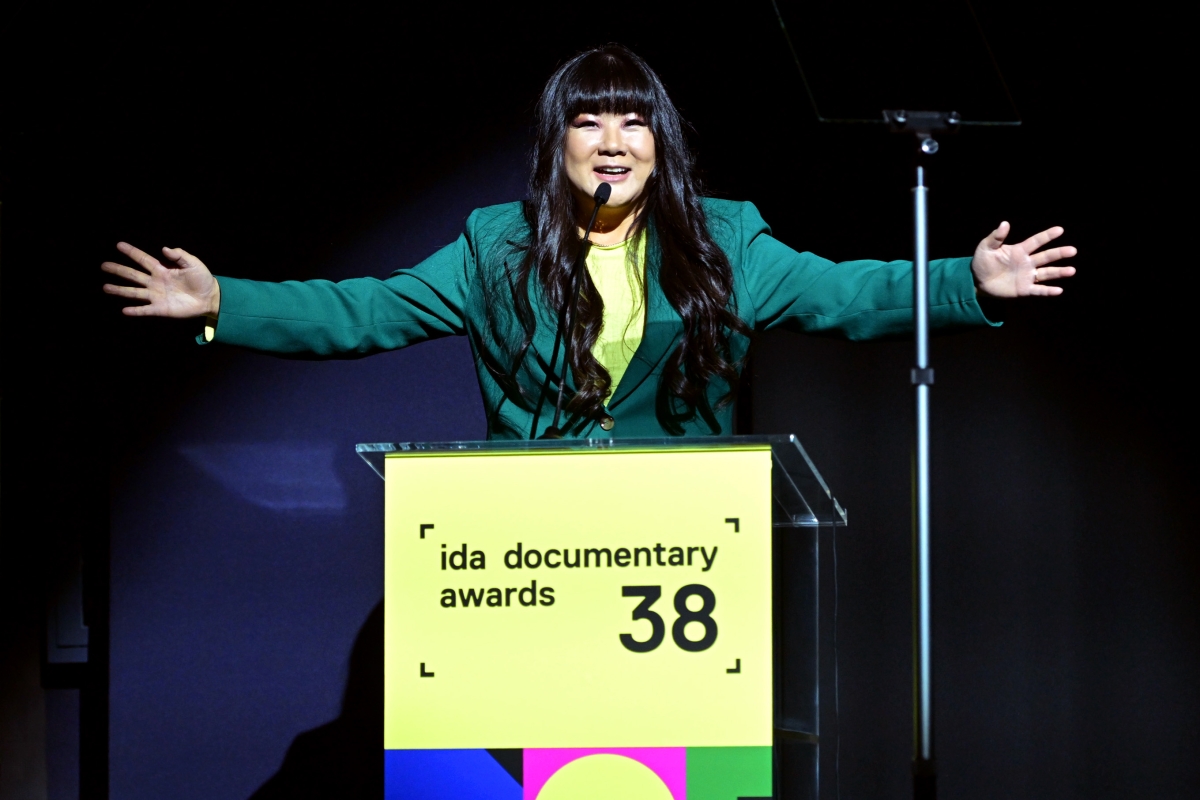 Host Jenny Yang on stage at the 38th IDA Documentary Awards on December 10, 2022, in Paramount Theater, Los Angeles. Photo Charley Gallay/Getty Images.
