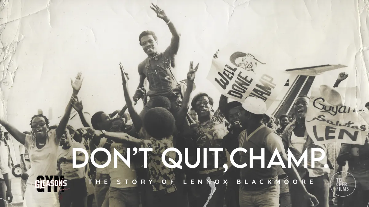 A black and white image of a Black man being carried by a group of people in celebration, with signs reading "well done, champ"