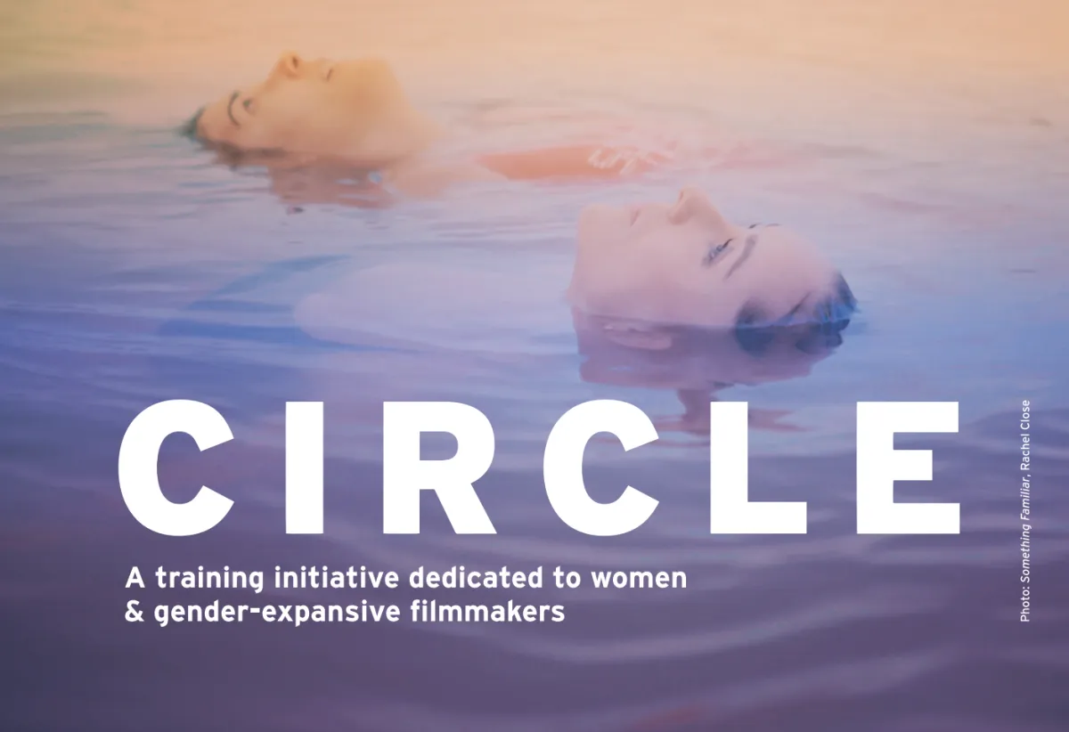 Two women immersed in water, and the text CIRCLE in white on the bottom of the page