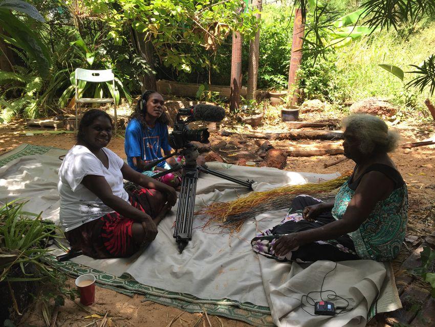  The Mulka Collective at work; two women sit with a camera facing toward an older woman. Photo courtesy of Mulka Collective
