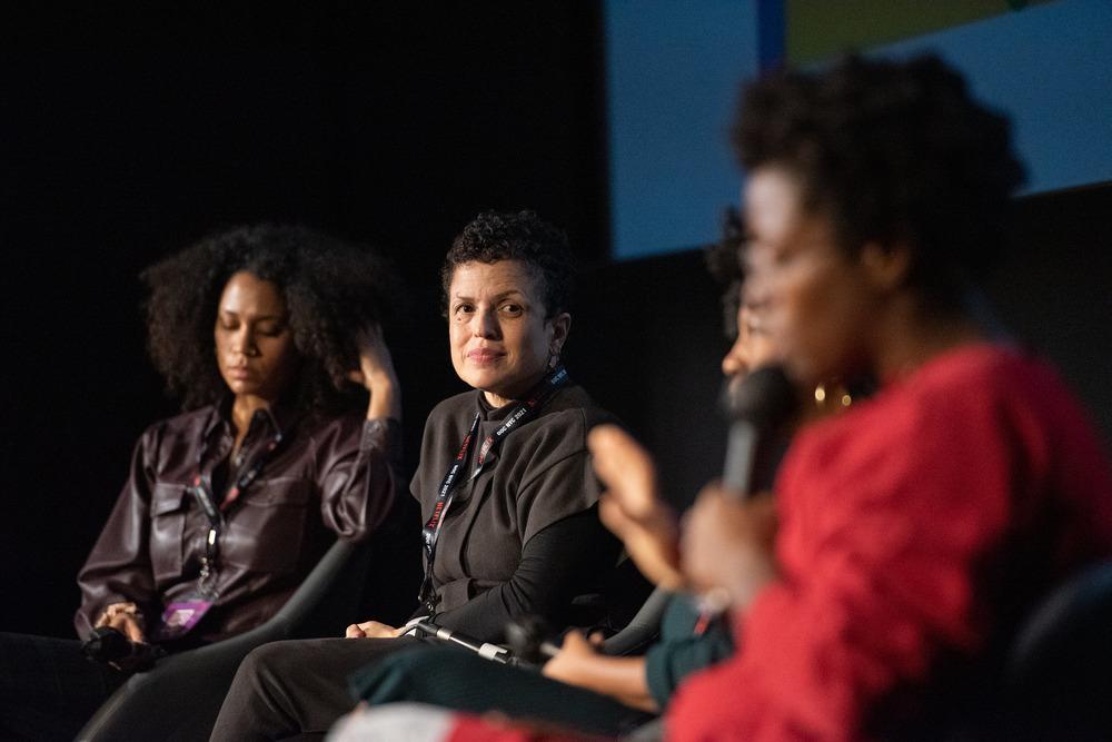 Four women sit on stage in discussion at a panel on distribution at DOC NYC 2021. Courtesy of DOC NYC.