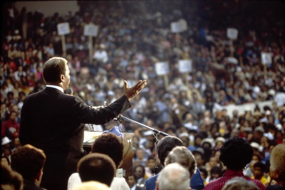 Harold Washington address over 10,000 supporters at the UIC Pavilion in February, 1983. Photo credit: Marc PoKempner.
