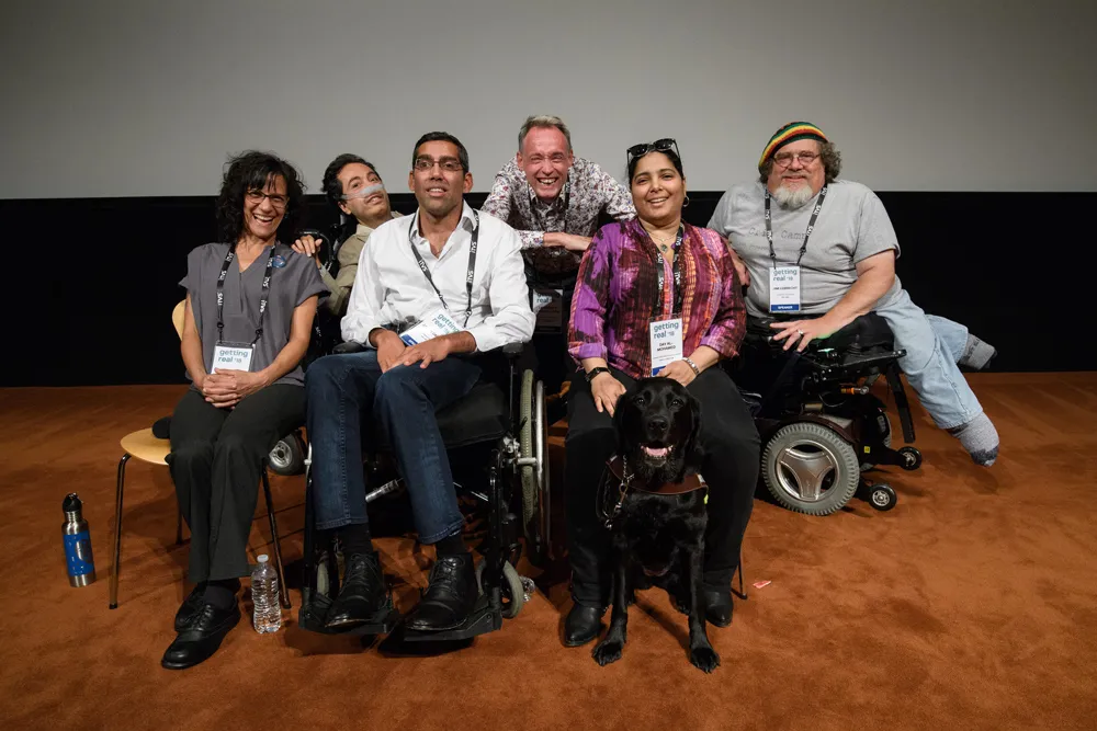 Group photo (from left to right) of Cheryl Green, unidentified conference participant, Jason DaSilva, Lawrence Carter-Long, Day Al-Mohamed and Jim LeBrecht.