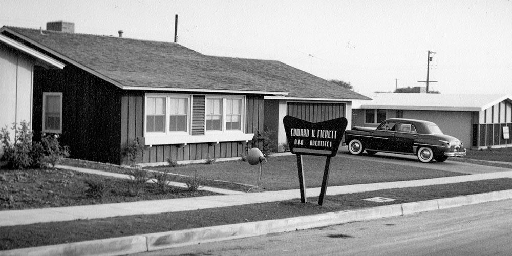 A black and white photograph of a mobile home.