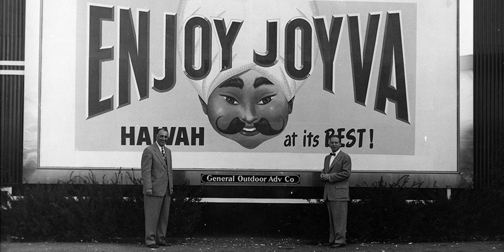 Black and white photo of Joyva's billboard.