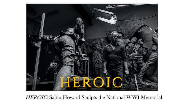 Sabin Howard stand in the middle of his sculpture studio surrounded by massive statues of charging soldiers.