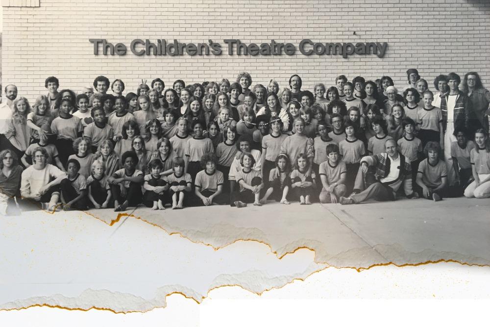 Black and white torn photo of theatre children some of which were victims of sexual assult. 