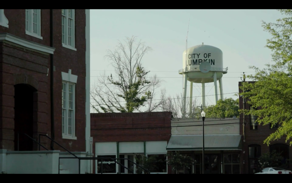 The city of Lumpkin Water Tower looms over the empty Old Town streets
