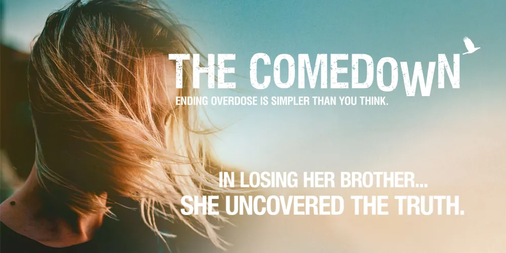 A woman with her hair flowing in the breeze.