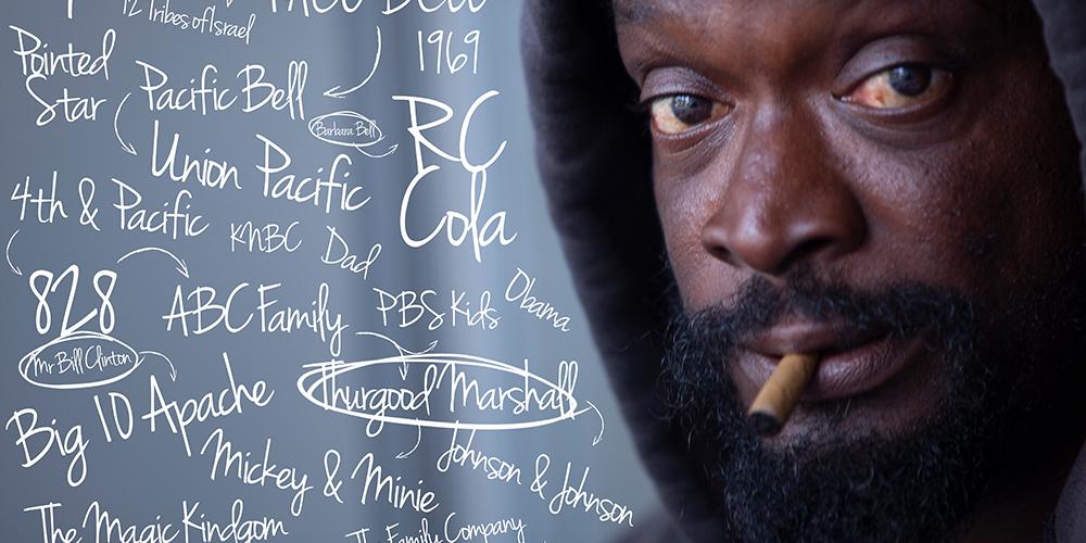 A Black unhoused man smokes a cigarette, handwritten thought maps surround his head.