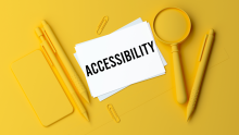 Graphic with yellow background featuring a yellow pen, yellow pencils, yellow paperclips, a yellow magnify glass, a yellow cellphone, and a stack of white note cards. The top note card has the word Accessibility written in black. 