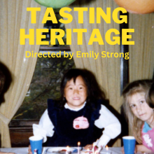All yellow uppercase film title, "Tasting Heritage" is in the center with the director's name, Emily Strong, below. The text overlaps a birthday photo of a young, approximately six year old Korean-American girl, named Emily Flynn, in front of a platter of cupcakes with lit birthday candles in them. There is one brunette girl on her right side, and one blonde and one brunette girl on her left side, all around the same age.