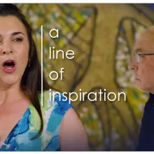 The film title "A Line of Inspiration" is aligned vertically between the face of a female singer and a male pianist.