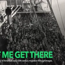 Black and white photograph of a crowd of people on a ship. Green text reading "Let Me Get There" is in the bottom right corner.