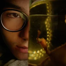 Close-up of a teen with glasses staring into a jar that holds an insect that feels lit from within against a dark backdrop