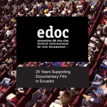 A high-angle view showing sections of occupied seats in a film theater. Overlaid on the image is a black box featuring the EDOC Film Festival logo with the text "Encuentros del Otro Cine Festival Internacional de Cine Documental" and the anniversary phrase "25 Years Supporting Documentary Film in Ecuador".