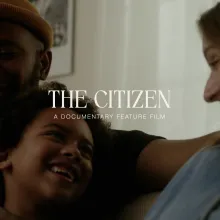 Yves, his son Jones and wife Gretchen sit happy in their home.