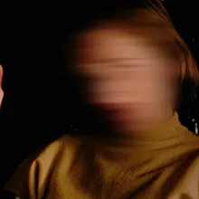 An image of a woman holding a cigarette, but her face is blurred. From Carl Elsaesser’s ‘Home When You Return,’ which is playing at Prismatic Ground. Courtesy of the festival.