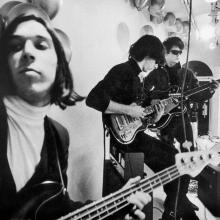 Three members of the Velvet Underground rehearsing in the studio. All are playing guitars. From Todd Haynes' 'The Velvet Underground.' Courtesy of Apple TV.