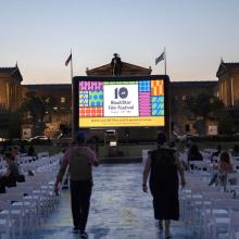 An outdoor venue for the 2021 Black Star Film Festival; the screen shows the BlackStar Film Festival logo. Photo courtesy of Terrell Halsey