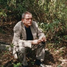 A man sits amongst nature from 'Krzysztof Kieslowski: I'm So­ So.'