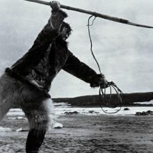 A person wields a spear, from Robert J. Flaherty's 'Nanook of the North'