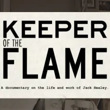 An office crowded with files and books with a white square over the office containing the title and subtitle: Keeper of the Flame, A documentary on the life and work of Jack Healey.