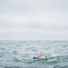 Kim swims near the San Francisco coast.