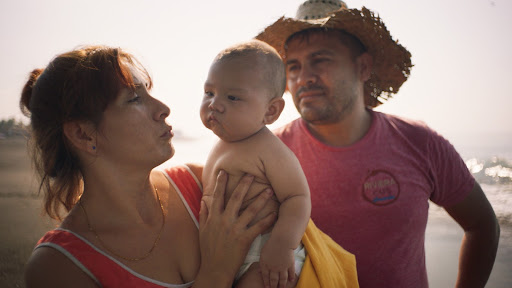  (l. to r.) Débora Andrade Maraveles (Mother), Miguel Andrade (Baby Sansón) and Ramón Gómez Mejía (Father), as seen in Sansón and Me, directed by Rodrigo Reyes. Photo credit: Alejandro Mejía. Courtesy of Grumpy Squared LLC.